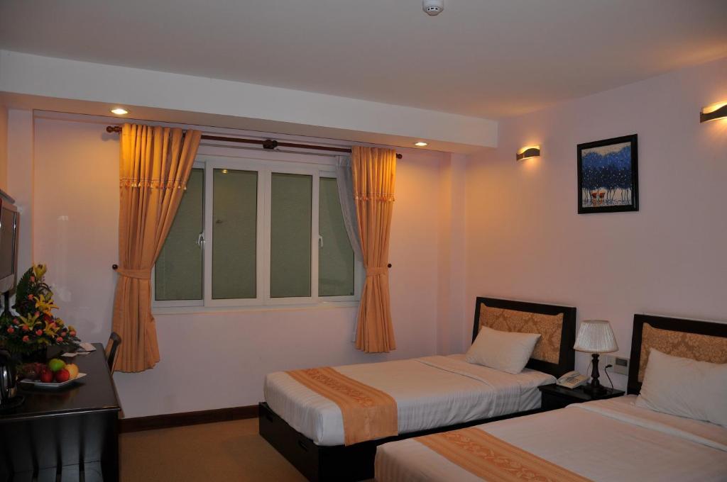 Dong Kinh A Hotel Хошимин Номер фото